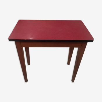 Side in red Formica table