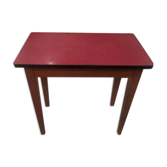 Side in red Formica table