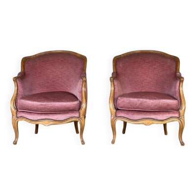 Paire de bergères de style Louis XV en bois sculpté, velours rose vers 1900