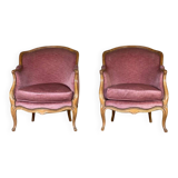 Pair of Louis XV style bergère armchairs in carved wood, pink velvet, circa 1900
