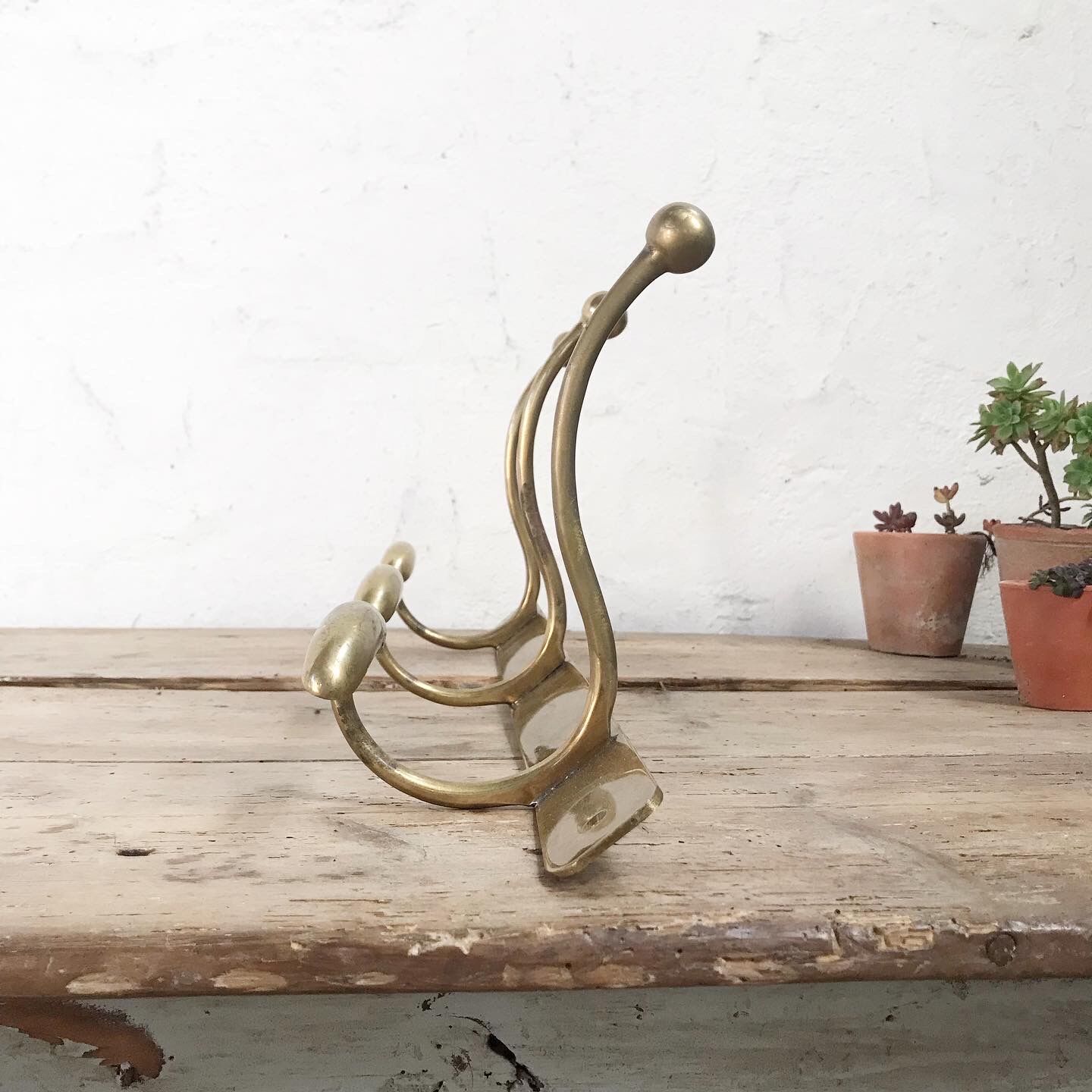 Brass wall coat rack