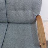 Three seater sofa in fabric and wood