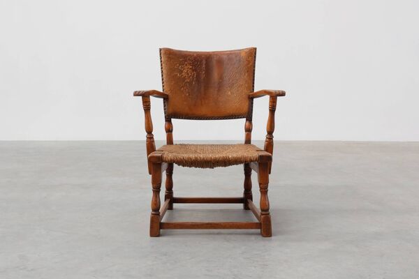 Fauteuil en cuir et chêne par Theo Ruth pour Artifort, Pays-Bas, années 1940
