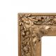 Miroir ancien dans un cadre richement décoré, France.