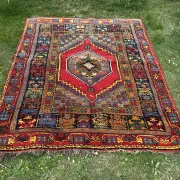Old Moroccan carpet, made of natural wool and handwoven.