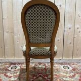 Suite de 4 chaises style Louis XVI "Fer à cheval"