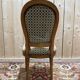 Suite de 4 chaises style Louis XVI "Fer à cheval"