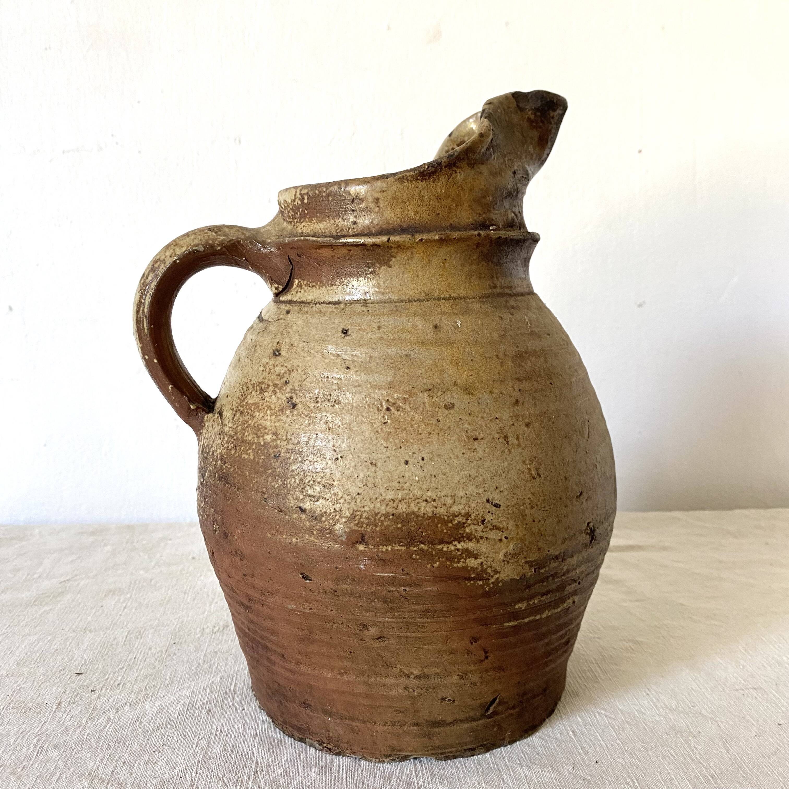 Antique terracotta pitcher