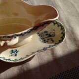 Old gravy boat on frame in terre de fer earthenware by gien, “chardons” model in blue-green
