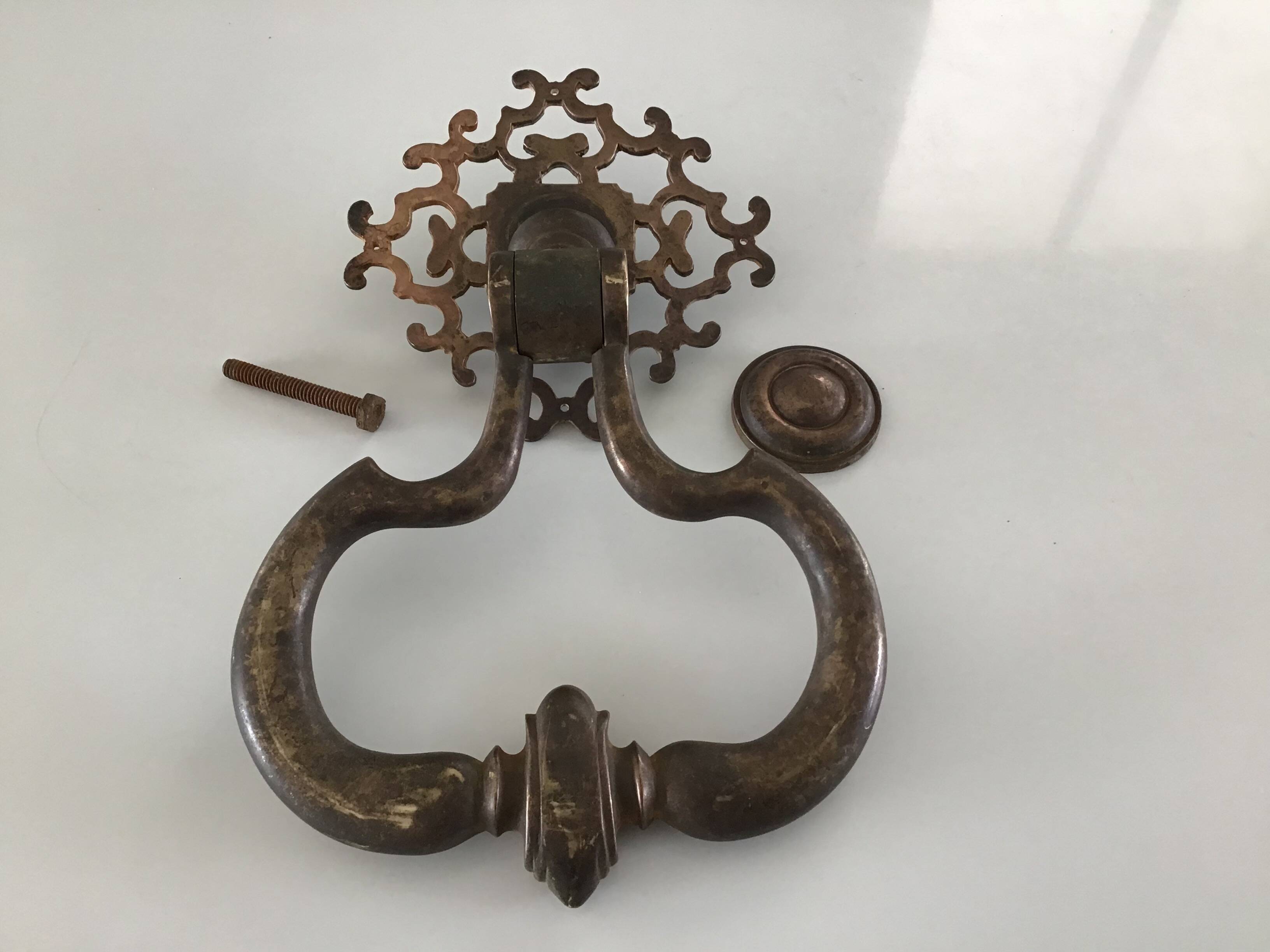 Antique bronze door knocker