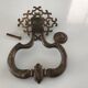 Antique bronze door knocker
