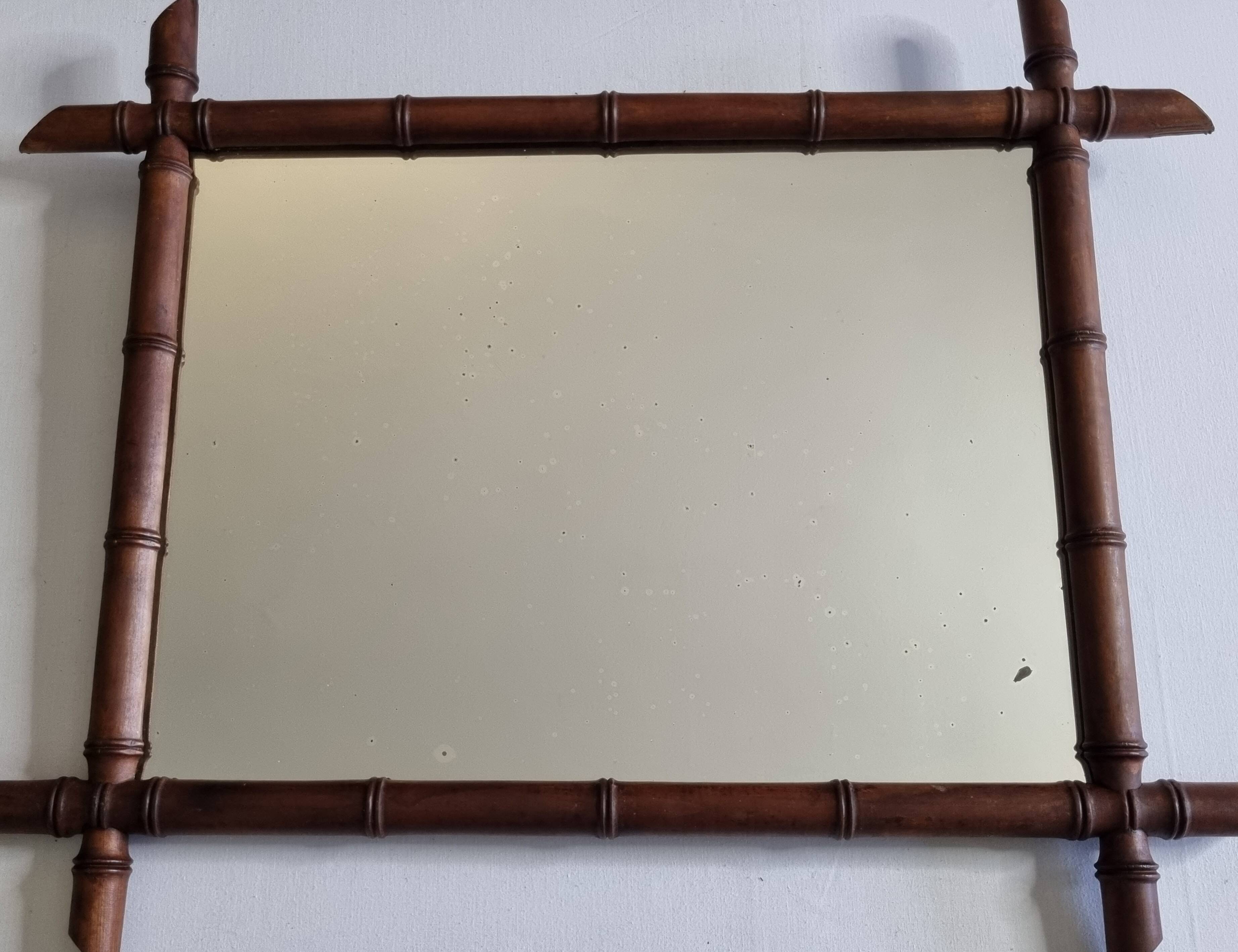 Miroir mural en bois tourné façon bambou, style Napoléon III, XIXe 67x56 cm