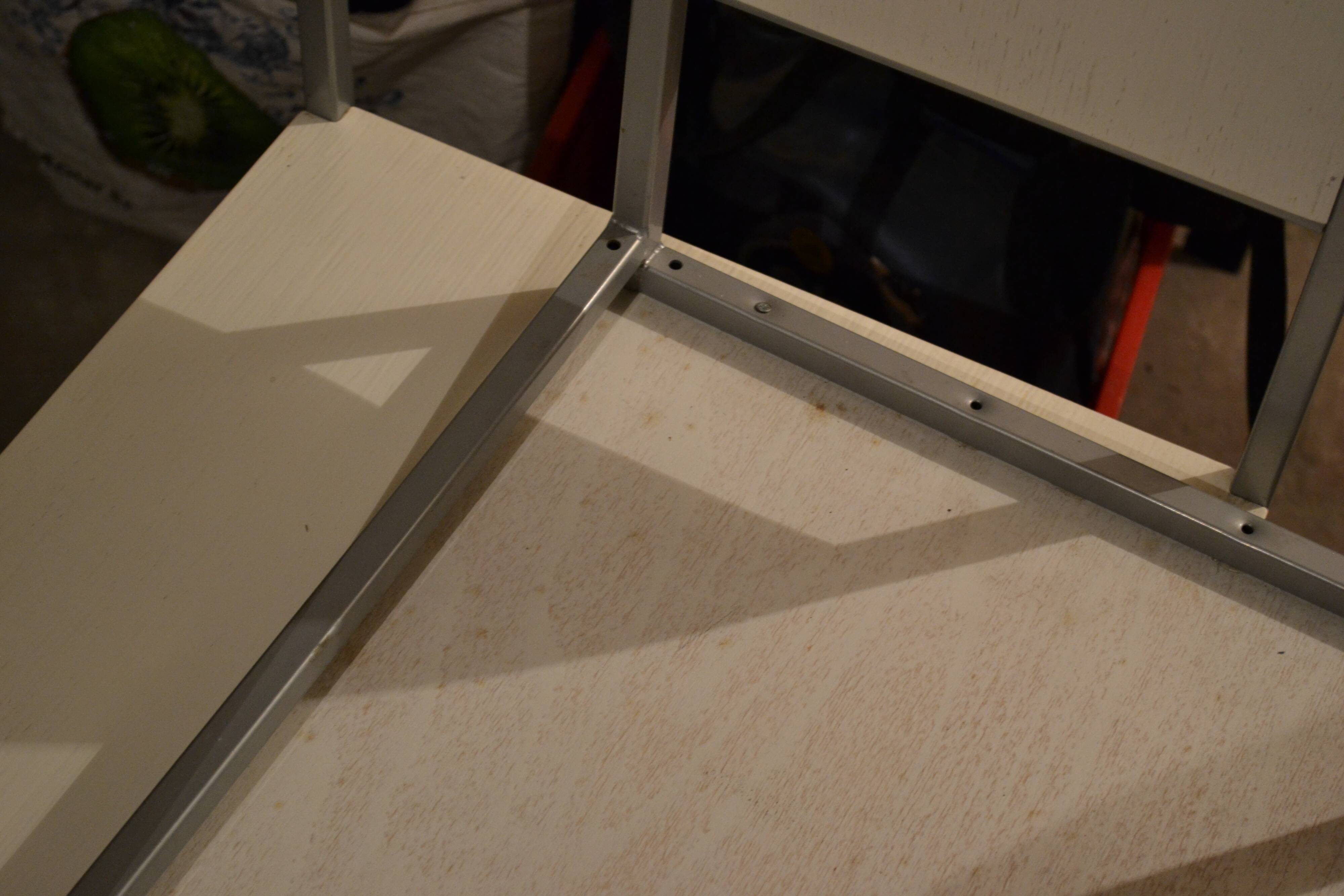 Set of 4 vintage metal and wood chairs from the 1990s.