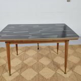 Adjustable vintage table with formica extension cords