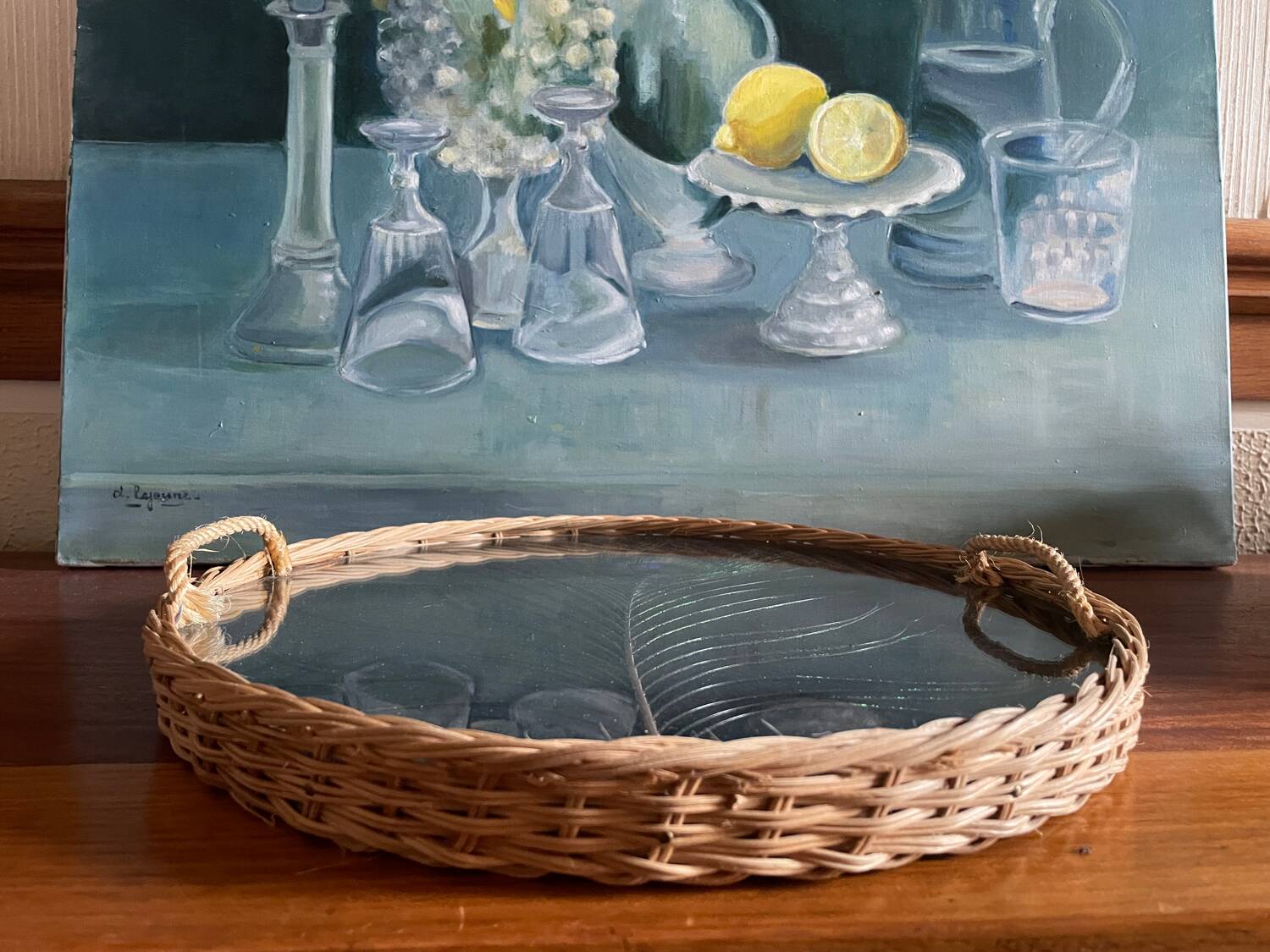 Vintage rattan tray with peacock feather