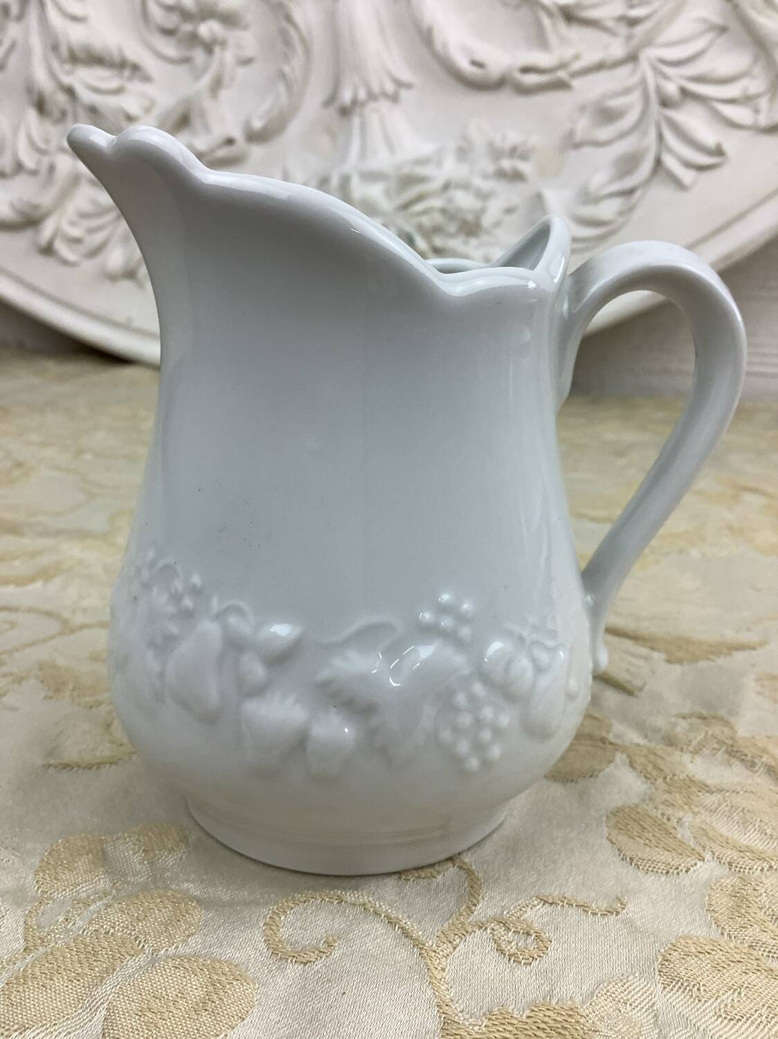 Small white porcelain milk jug