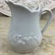 Small white porcelain milk jug
