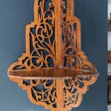 Old wall corner shelf in cut wood from the 1900s