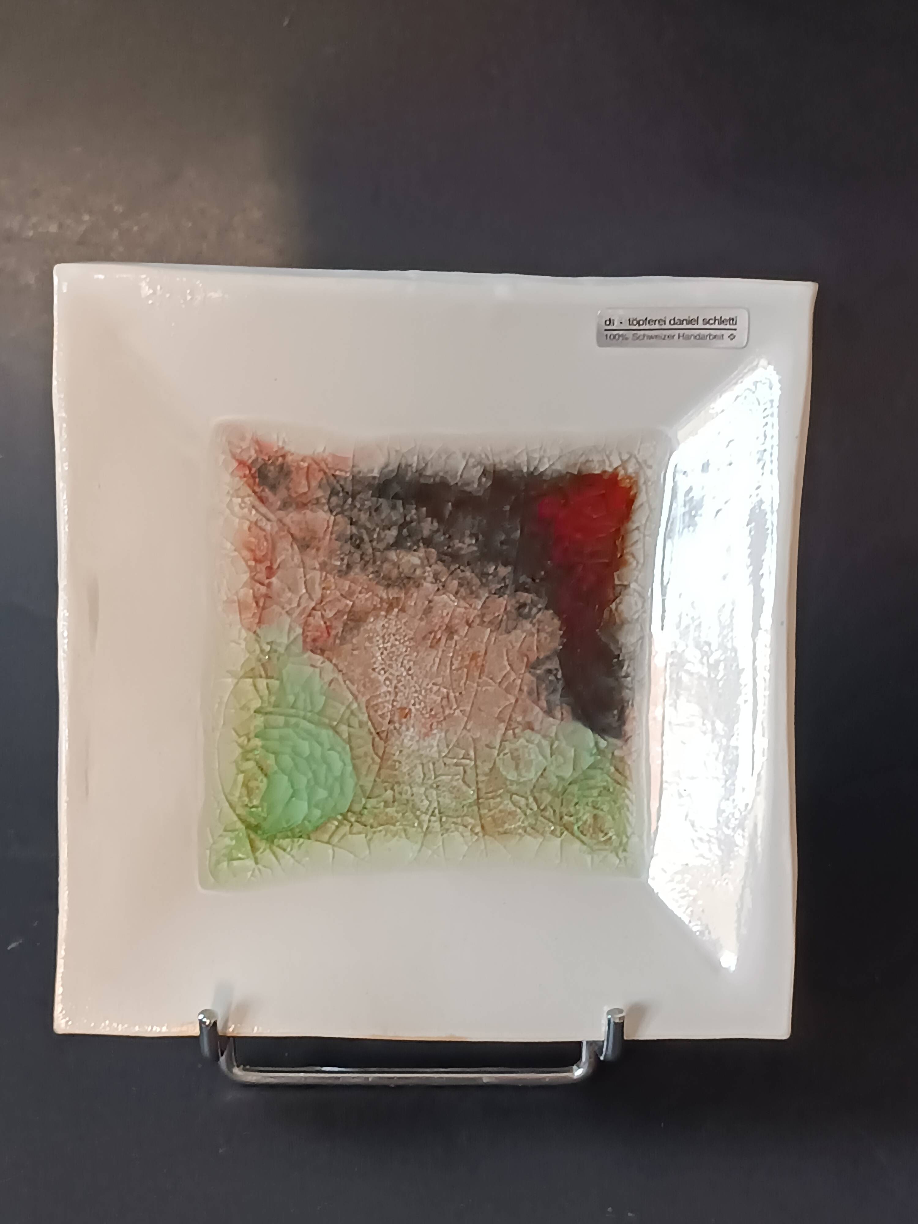 White ceramic and green crystal glass catch-all by Daniel Schletti.