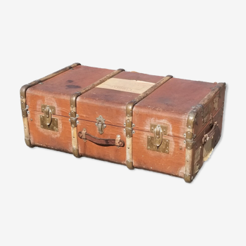 Old travel trunk made of wood and brass