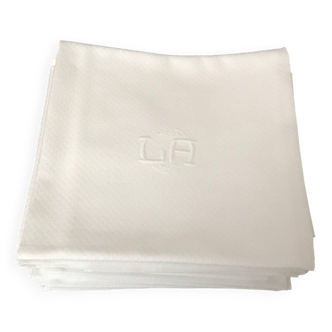 12 serviettes en damassé blanc au monogramme LA