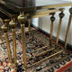 Series of 3 empire style nesting tables in brass and glass