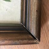 Oil on canvas with lily decoration in frame