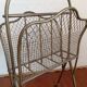 Brass magazine rack in neo-classical style, 20th century.