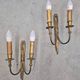 Pair of Louis XVI style bronze wall sconces with bow and tassel, 1940s.