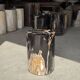 Black petrified wood side table with beige stripes, star pattern H35 D24.