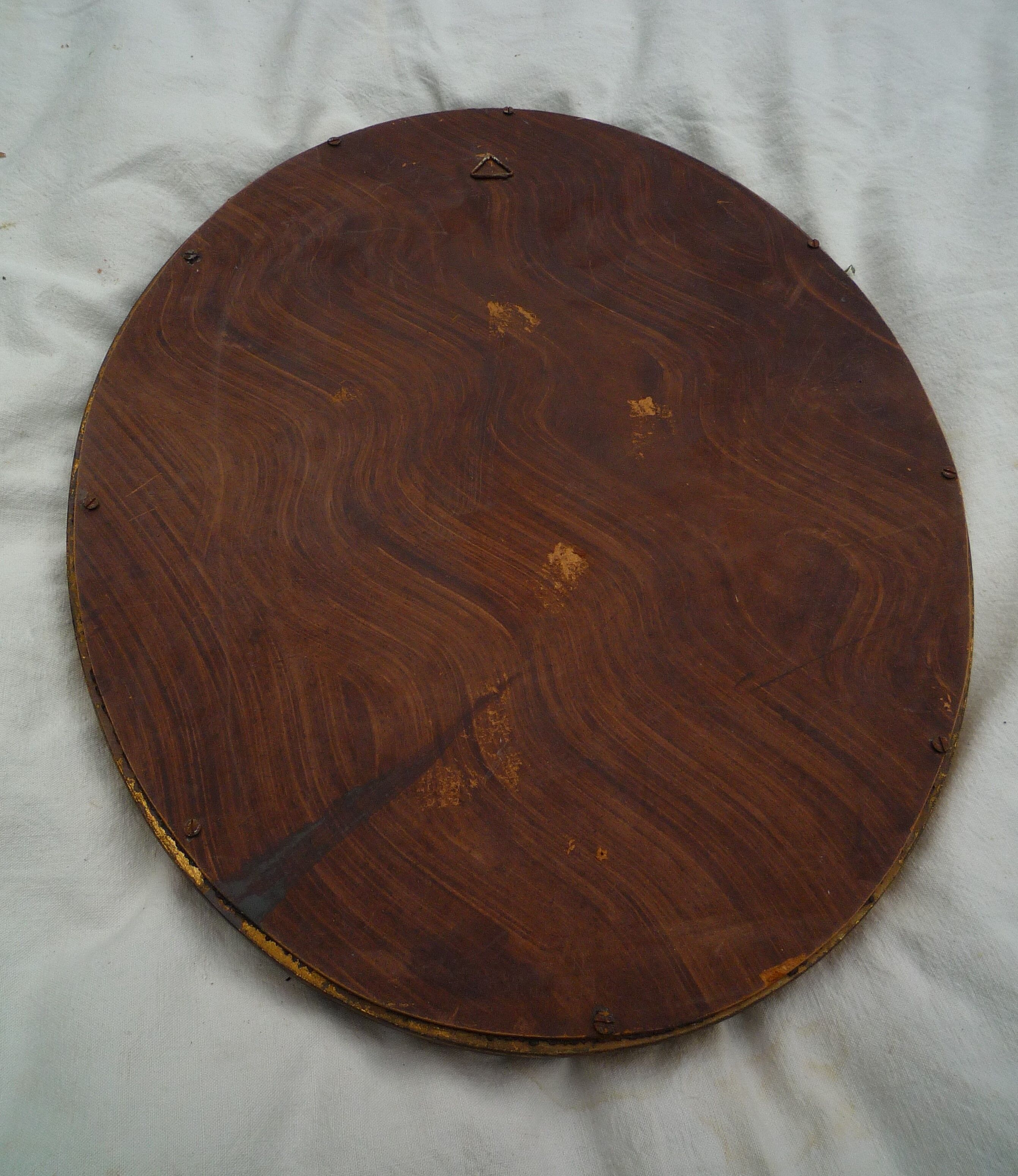 Miroir ovale ancien cadre en bois doré 45x35cm