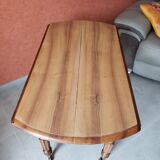 Old round table in walnut with flaps Louis Philippe