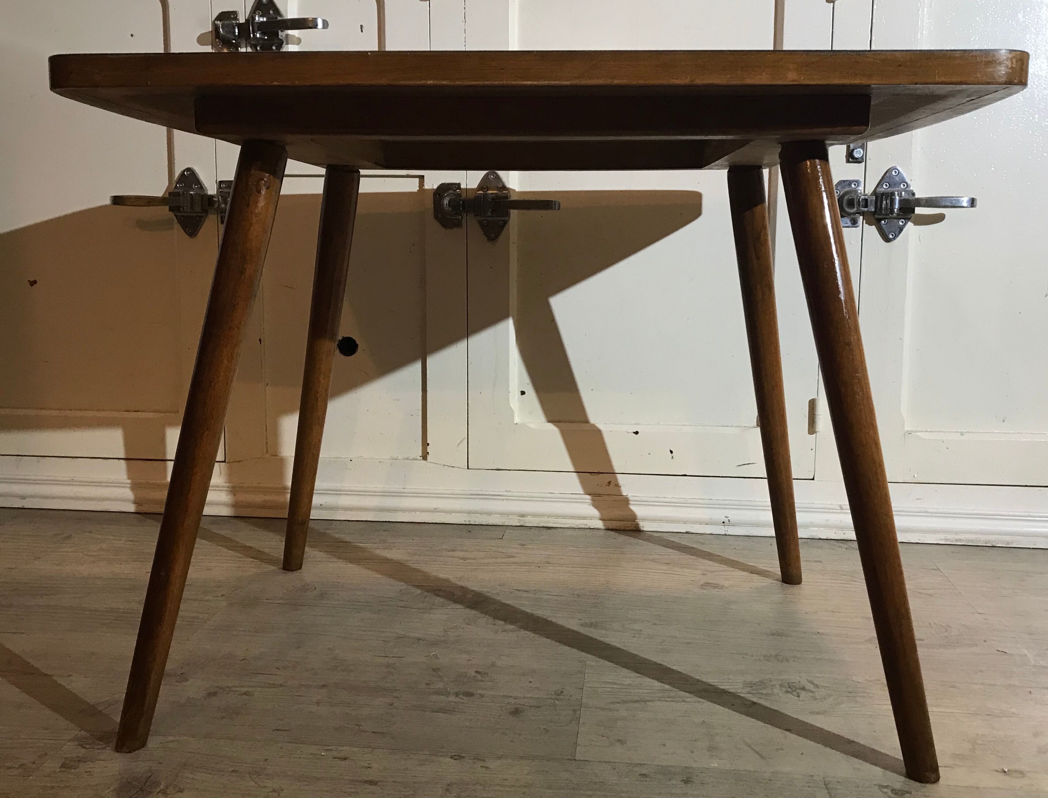 Vintage coffee table feet wooden compass and light grey formica