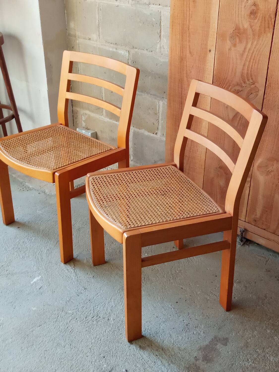 Pair of Baumann caned chairs, 70s/80s