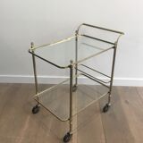 Neoclassical brass rolling table with double glass tops