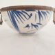 Asian bowl with metal frame imitating bamboo