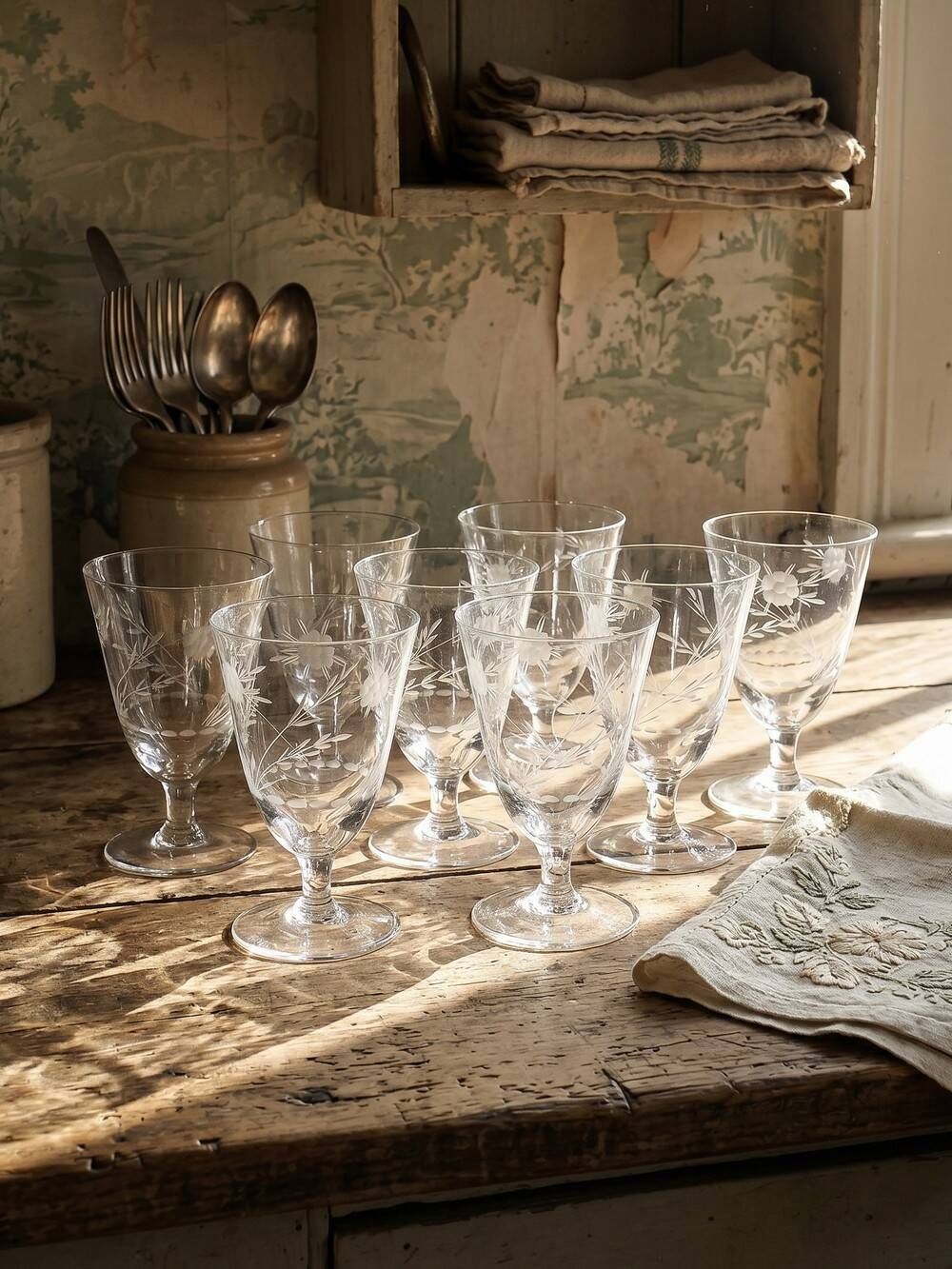 8 engraved crystal wine glasses with a floral design, Bohemia, early 20th century.