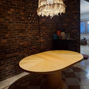 Round table in lemon wood with timeless design