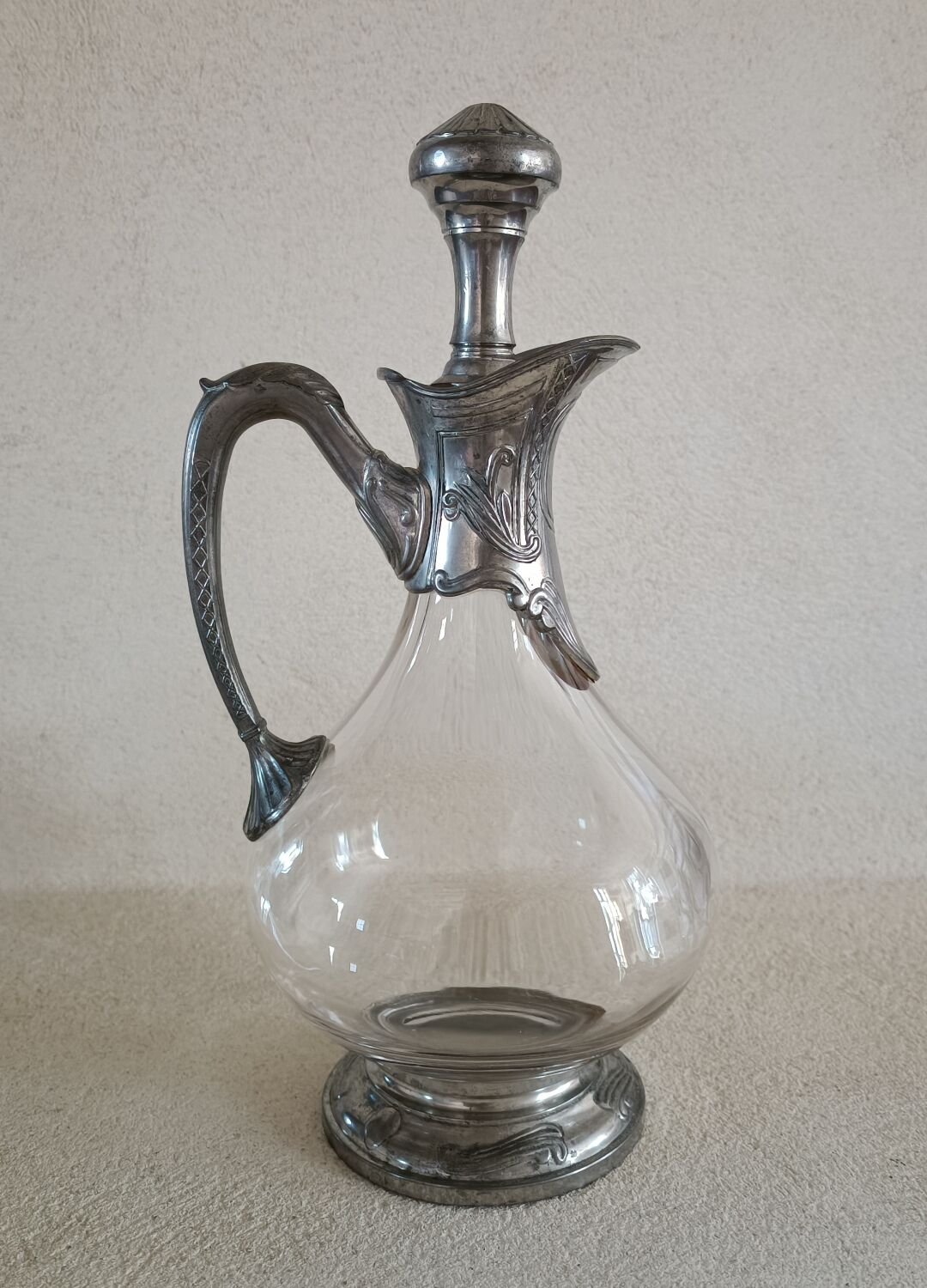Ewer decanter with tin mount