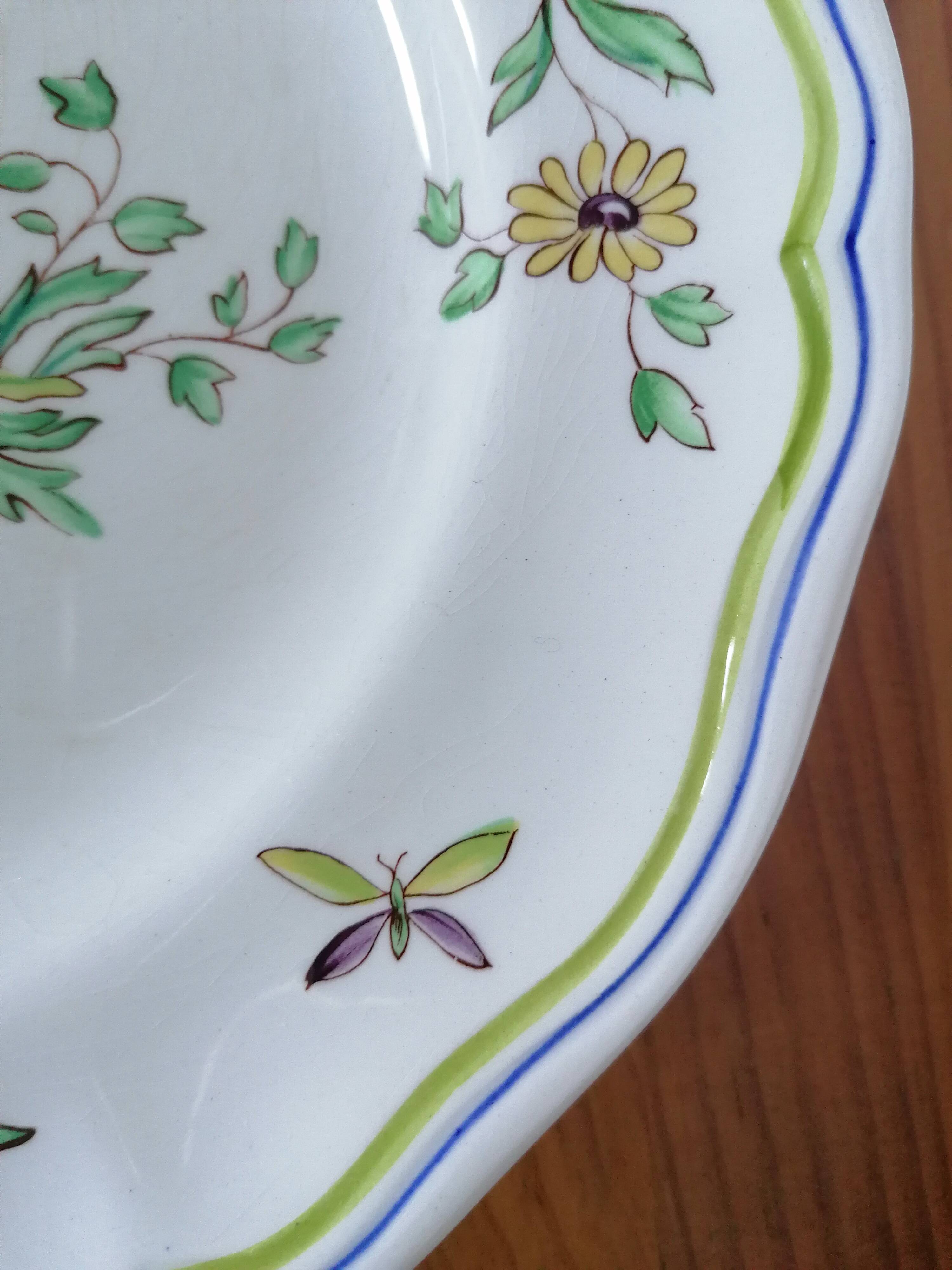 Assiette en faïence de Longchamps décor pèlerin