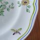 Assiette en faïence de Longchamps décor pèlerin