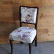 Art Deco chair in wood and white velvet, floral backrest from the 1930s.
