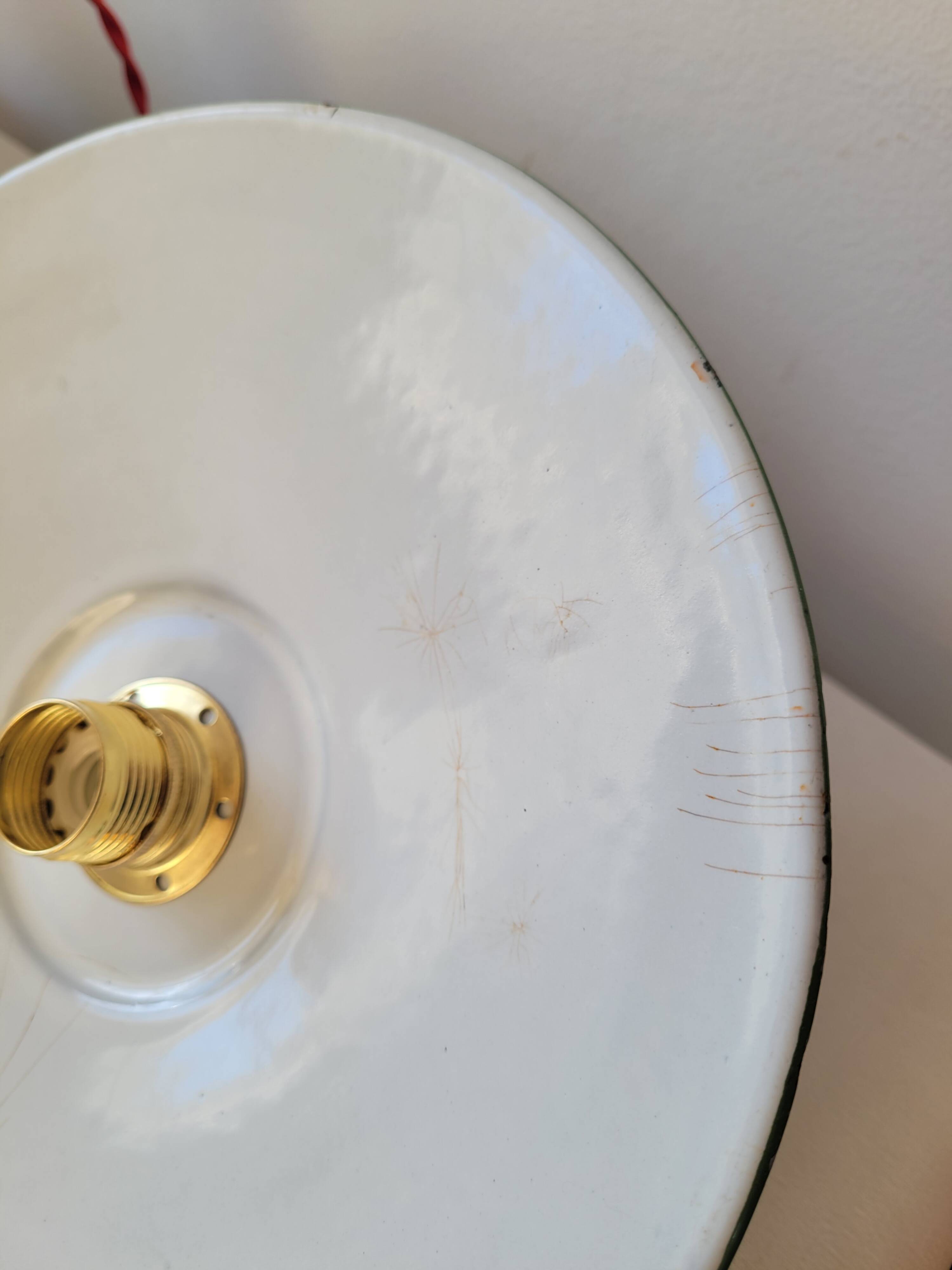 Trio of enameled sheet metal pendant lights