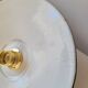 Trio of enameled sheet metal pendant lights