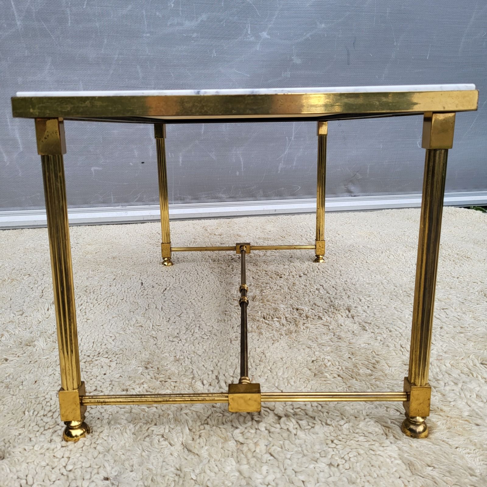 Hollywood Regency style coffee table • marble and brass