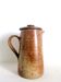 Duo of pyrity sandstone pots, 1960