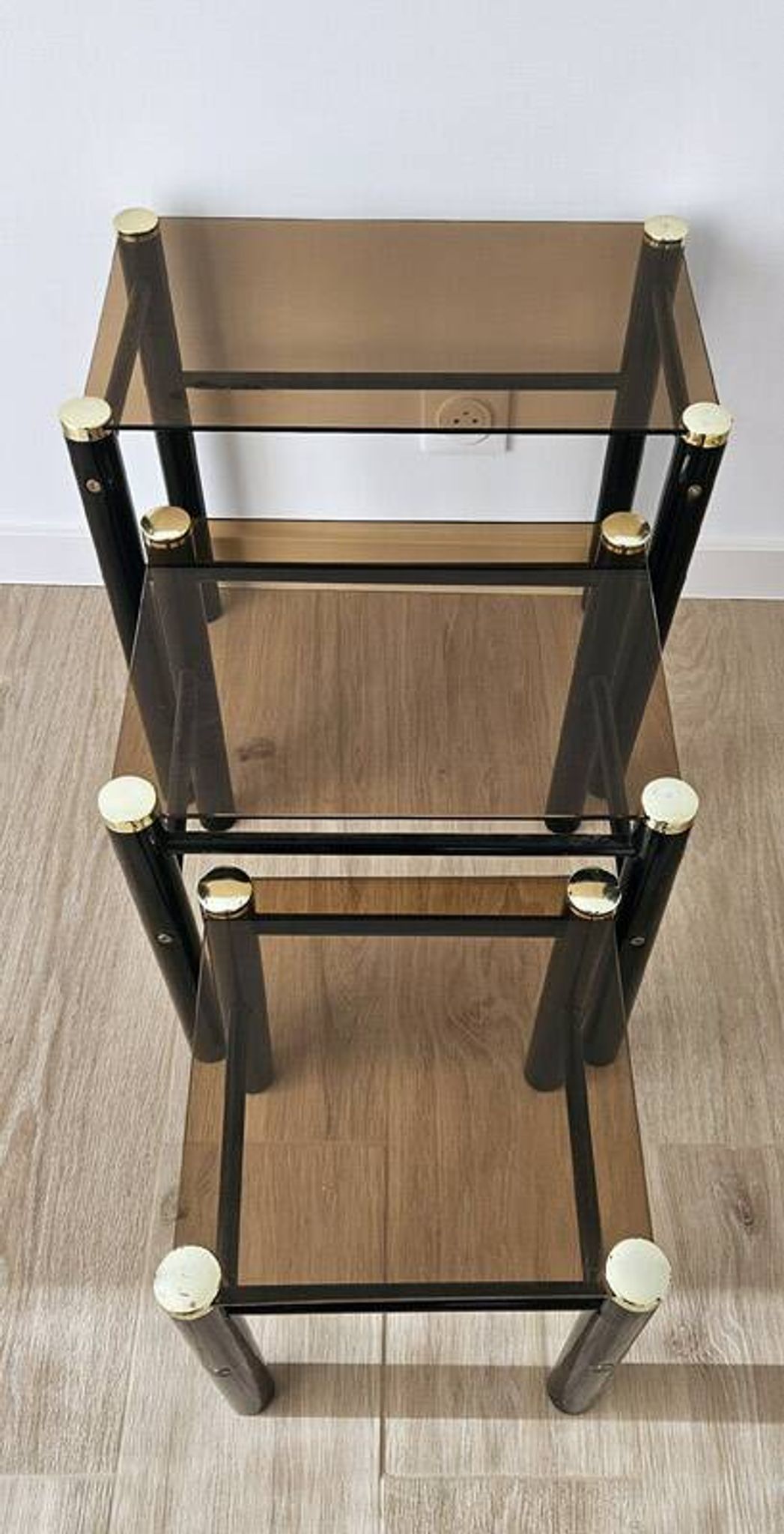 Set of 3 vintage nesting tables in smoked glass and black metal – 1970s