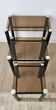 Set of 3 vintage nesting tables in smoked glass and black metal – 1970s