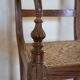 Fauteuil indonésien en acajou et cannage