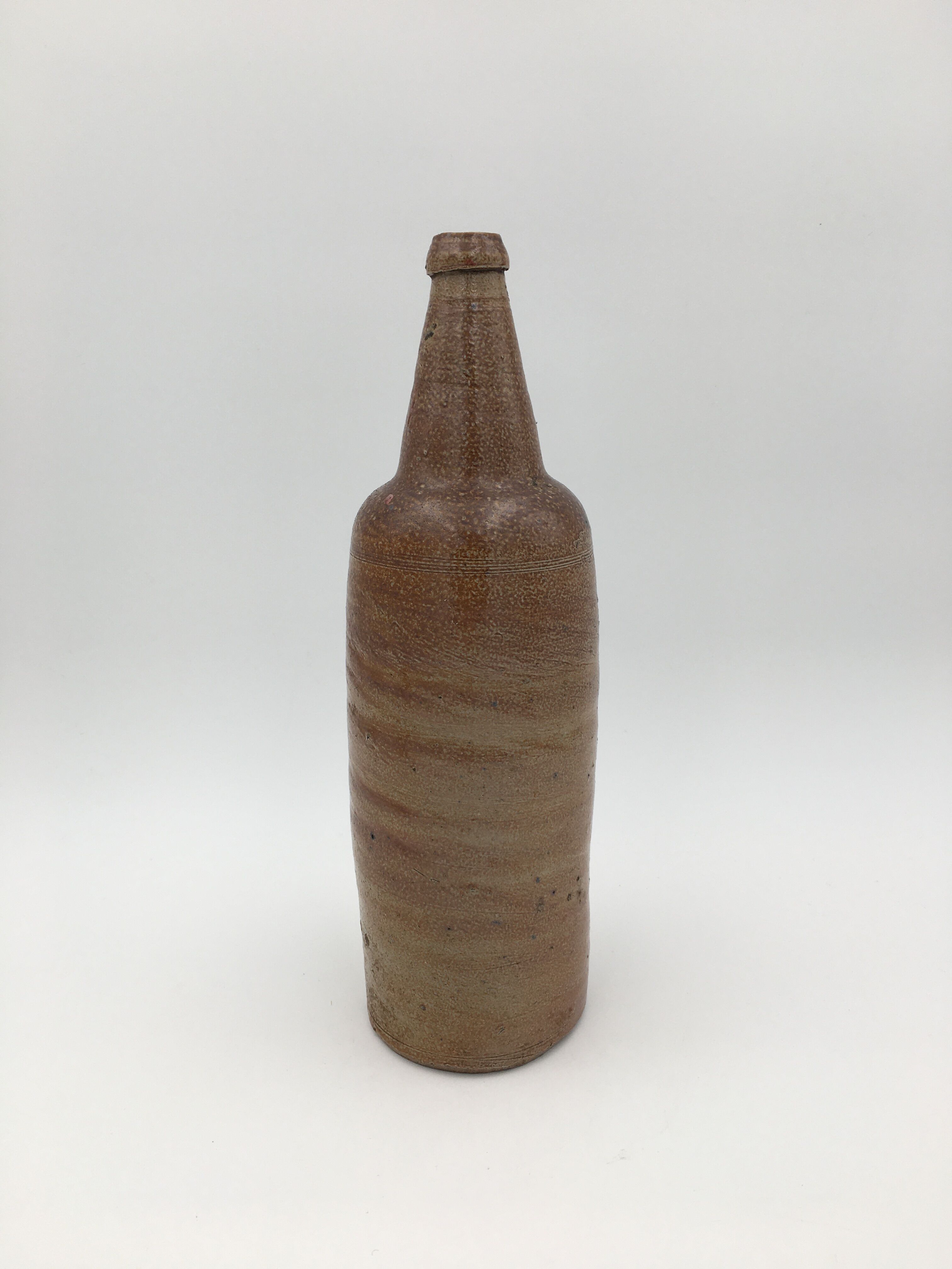 Old glazed terracotta bottle, early 20th century